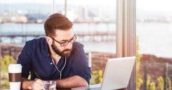 man-working-from-home-video-call